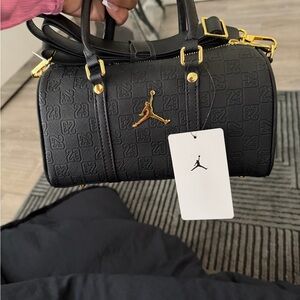 Jordan Black Handbag with Gold Details